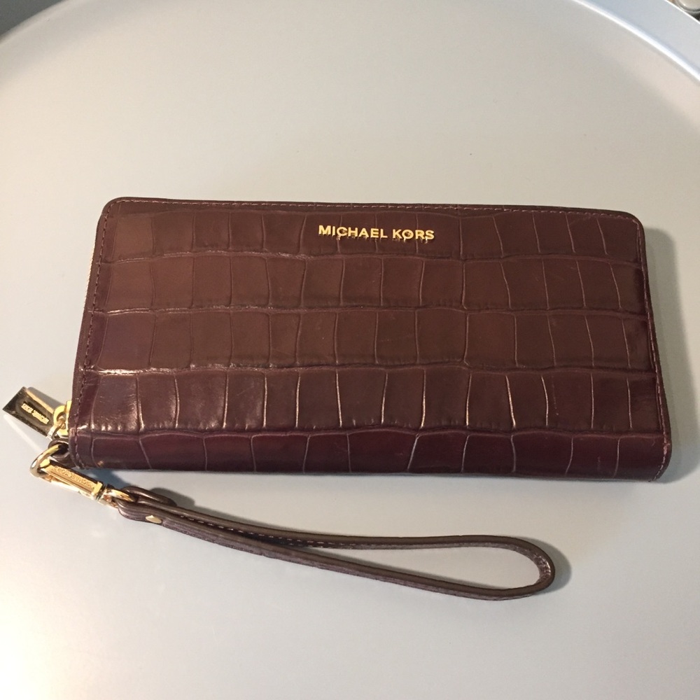 michael kors plum croc textured wristlet wallet